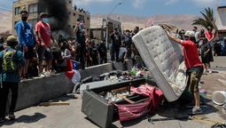 altText(Chile reubica a venezolanos y busca culpables en Iquique)}