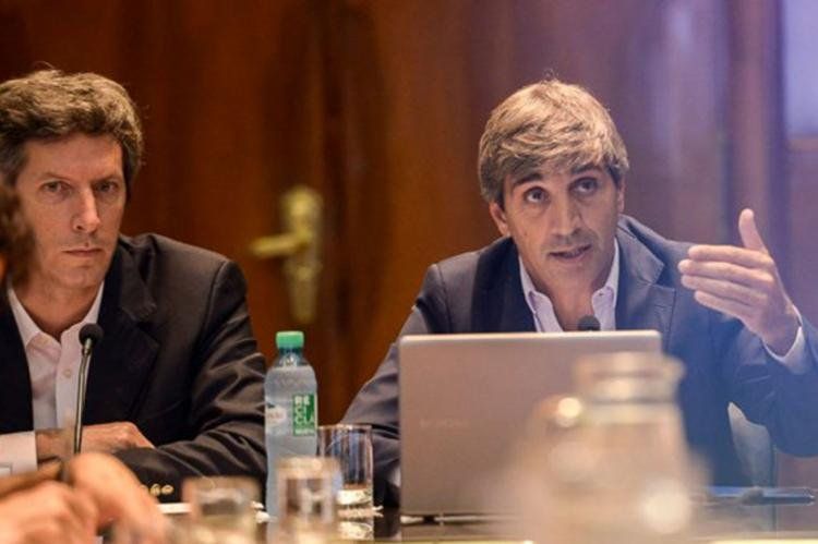 Santiago Bausili y Luis Caputo. Santiago Bausili y Luis Caputo.