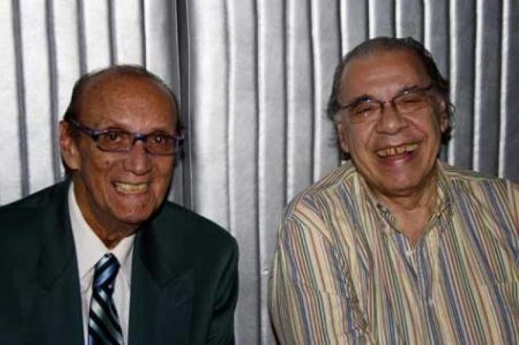 Junto a su cliente y amigo Enrique Pinti.