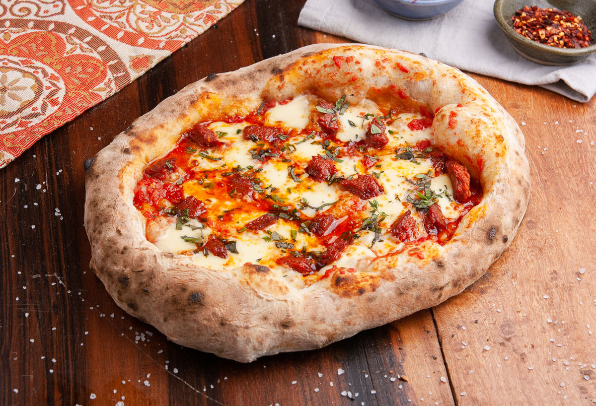 La especial Pizza Margherita que no te podes perder de degustar. Foto: Rappi