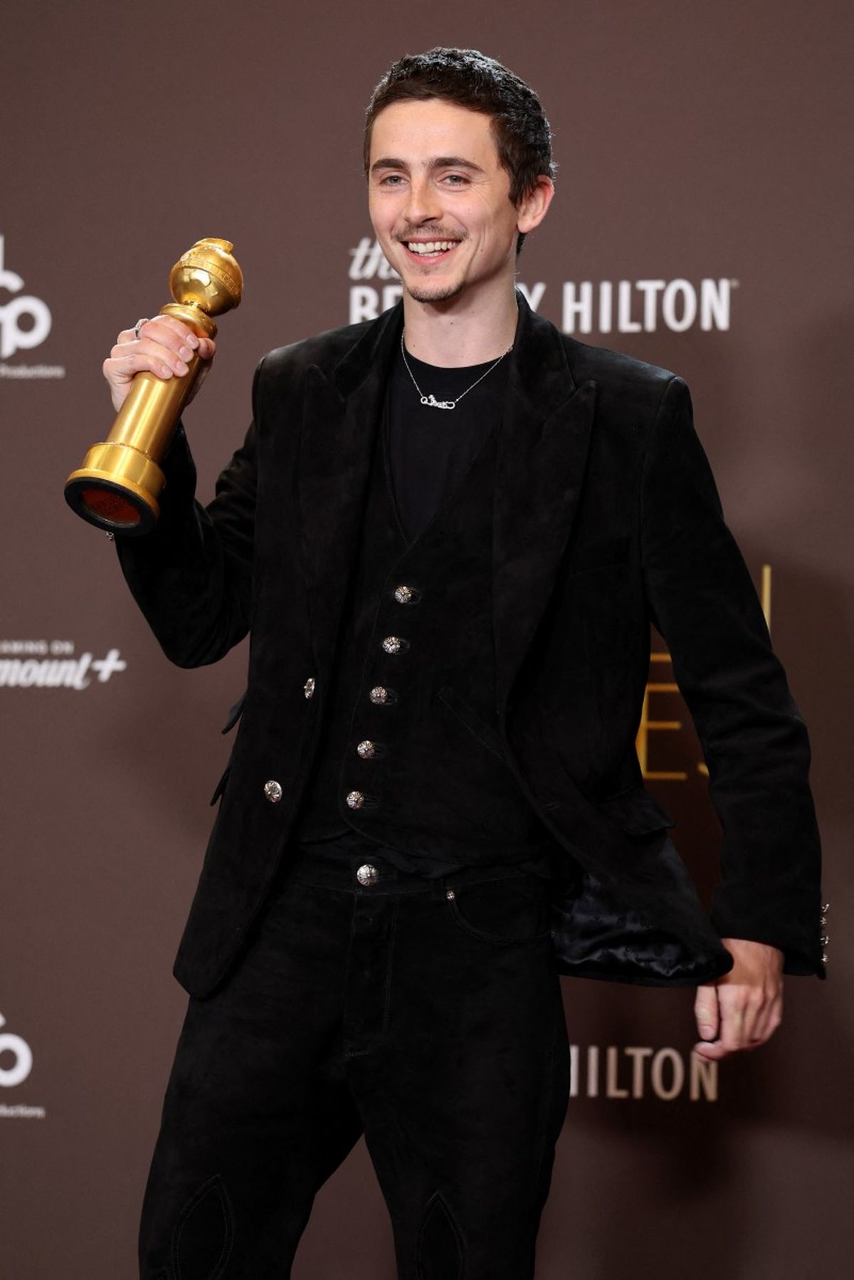 Timothée Chalamet, ganador del premio a la Mejor Interpretación Masculina en una Película - Musical o Comedia por Timothée Chalamet, ganador del premio a la Mejor Interpretación Masculina en una Película - Musical o Comedia por