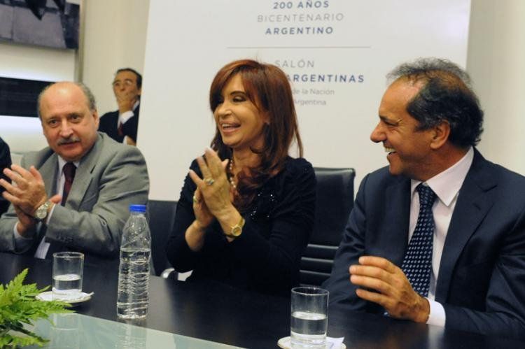 Pampuro, con su ex jefa Cristina y su actual jefe Scioli.
