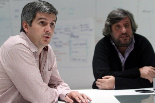 A la izq., Marcos Peña; a la der., Miguel De Godoy.