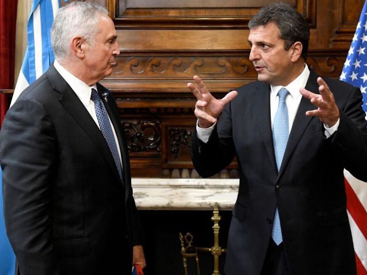 Marc Stanley y Sergio Massa.