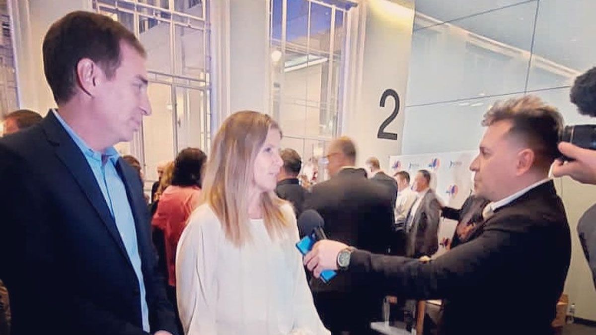 Santilli y Hotton, el martes, en los 40 años de la Asociación Cristiana de Iglesias Evangélicas de la República Argentina (ACIERA). 