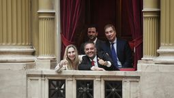 Karina Milei junto a Manuel Adorni y Diego Santilli.