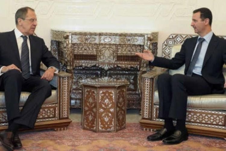 El canciller ruso, Sergey Lavrov, y el presidente sirio, Bashar Al Assad