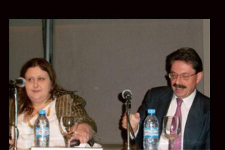 La foto es mala pero permite identificar, junto al ex titular de la Secom, Henoch Aguiar, a la abogada Graciana Peñafort Colombi, el poder en la AFSCA.