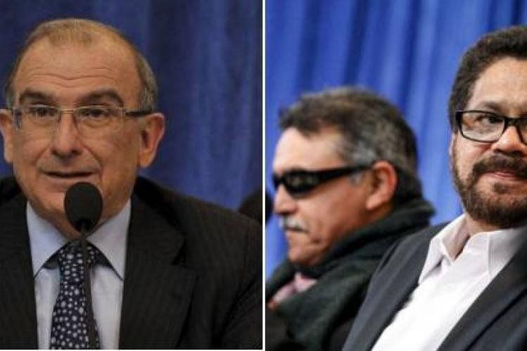 Humberto de la Calle Lombana y Luciano Marín, alias Iván Márquez.