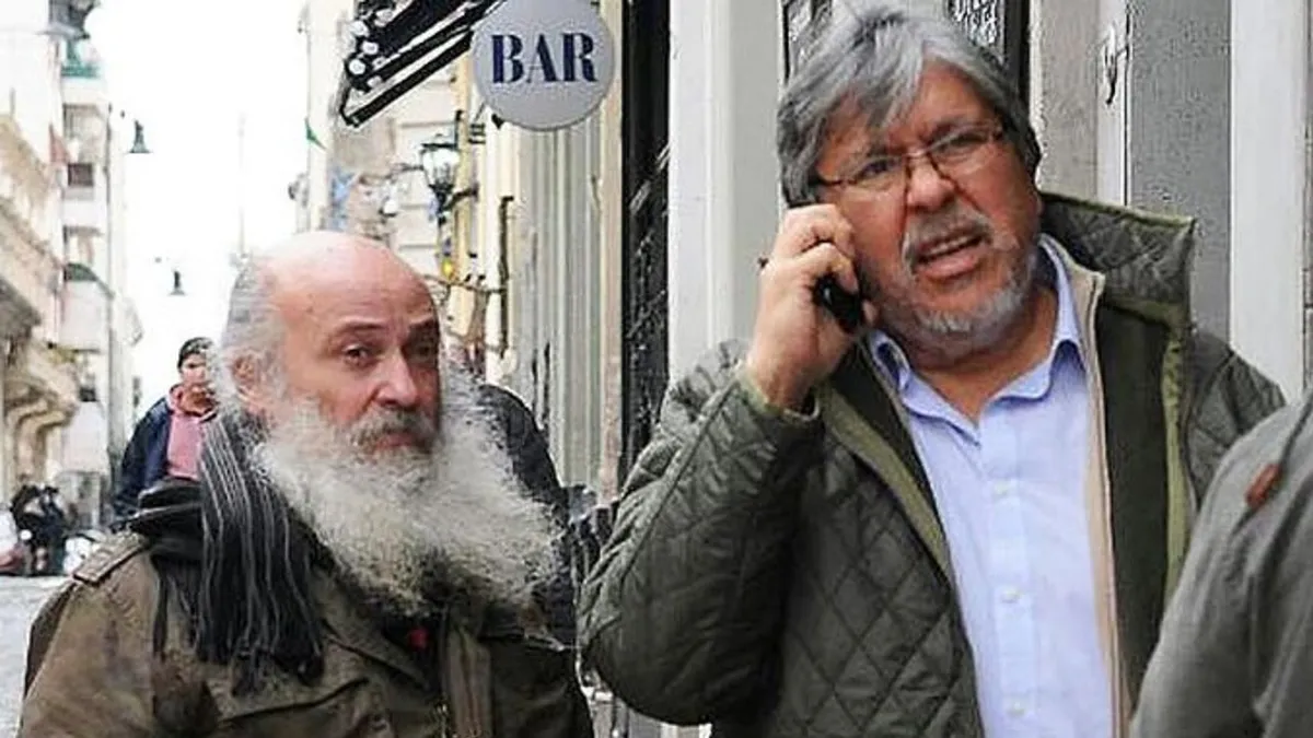 Las organizaciones piqueteras y organismos sociales que actúan como intermediarias son parte del problemas por los planes sociales. Emilio Pérsico y "Chino" Navarro, del Movimiento Evita.