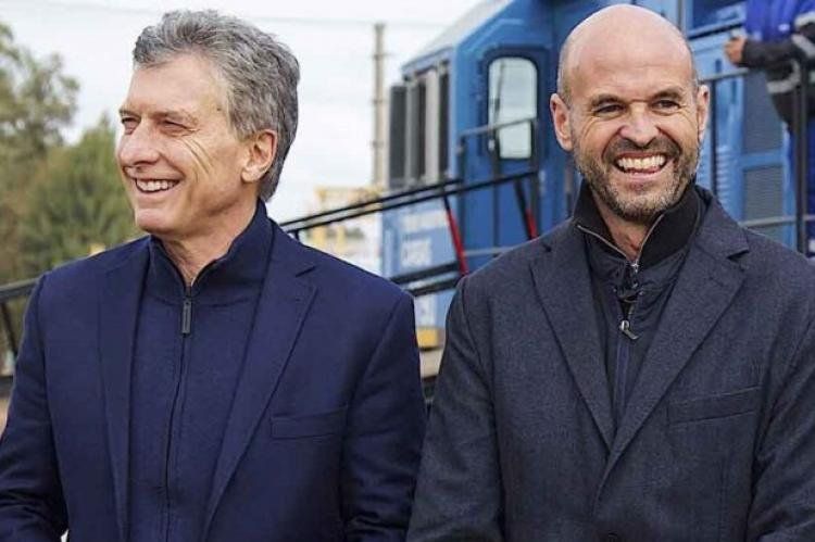 El ex ministro de Transporte Guillermo Dietrich (a la derecha), junto con el expresidente Mauricio Macri.