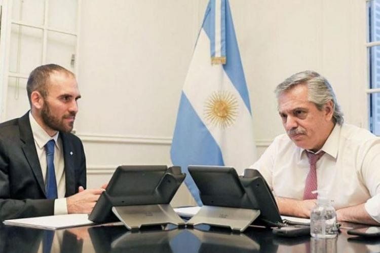 El Presidente y el ministro de Economía, Martín Guzmán.