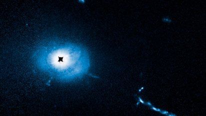 El Hubble aterra a la ciencia: Capturaron a un agujero negro devorando galaxias