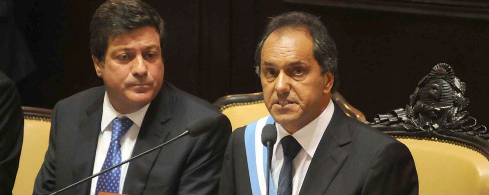 Juan Gabriel Mariotto y Daniel Scioli.