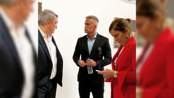 Leandro Camani (centro) y quien era el ministro de Transporte, Jorge DOnofrio, a quien dinamitó por investigarlo. Leandro Camani (centro) y quien era el ministro de Transporte, Jorge DOnofrio, a quien dinamitó por investigarlo.