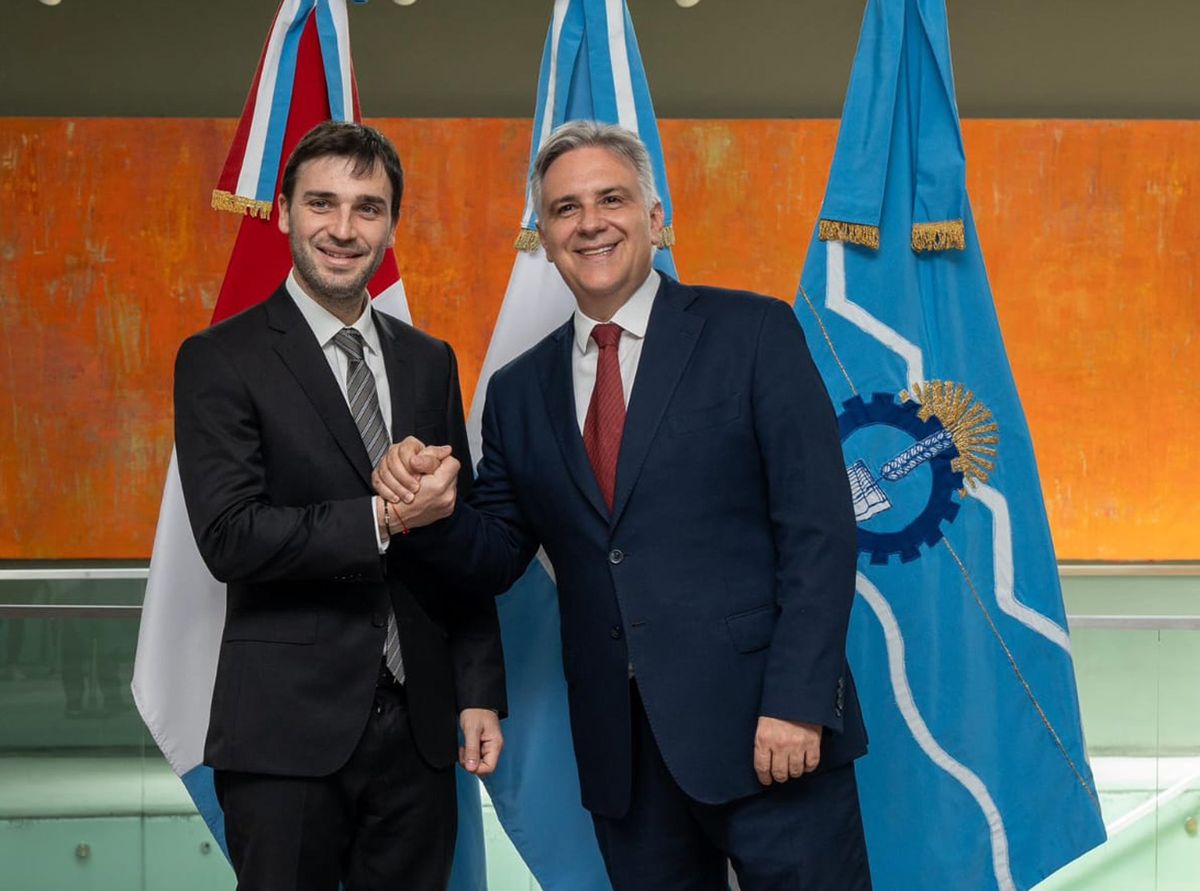 Nacho Torres y Martín Llaryora.