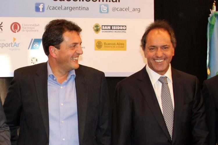 Sergio Massa y Daniel Scioli en el reciente acto que compartieron. El sábado se verán de nuevo.