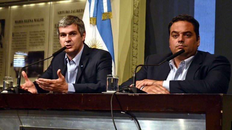 El jefe de Gabinete, Marcos Peña, y el ministro de Trabajo, Jorge Triaca.
