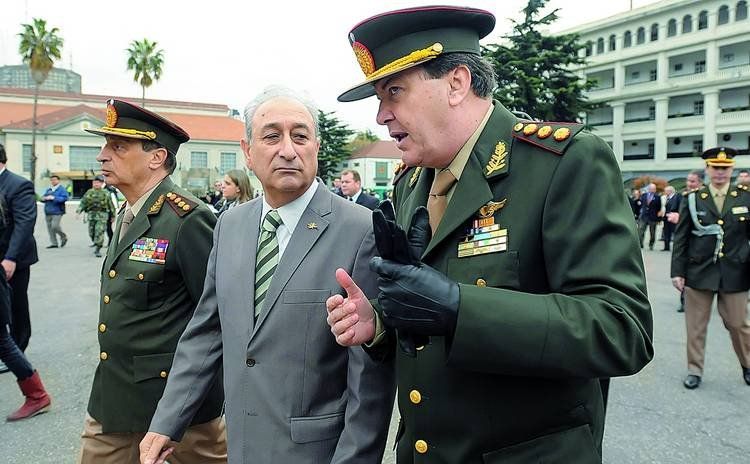 En primer plano, César del Corazón de Jesús Milani; en el medio, Arturo Puricelli; luego, Luis Pozzi.