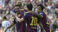 Messi, Neymar y Xavi celebran un gol en el Barcelona.