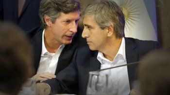 Luis Caputo y Santiago Bausilli. Luis Caputo y Santiago Bausilli.